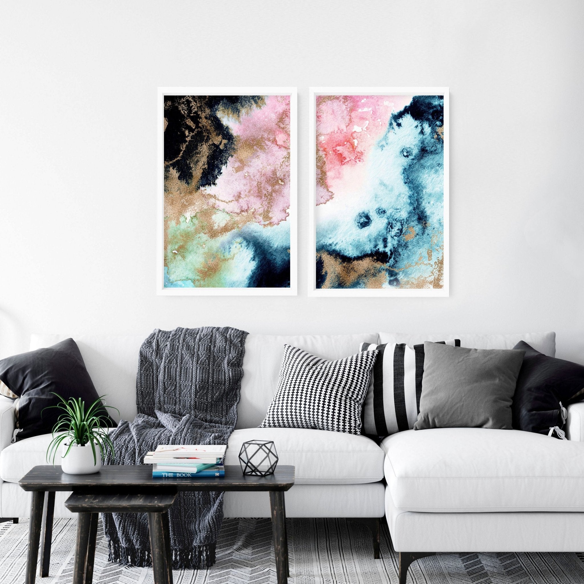 Set of 2 abstract modern wall art prints featuring vibrant alcohol ink marble textures and shimmering gold accents in sleek black frames.