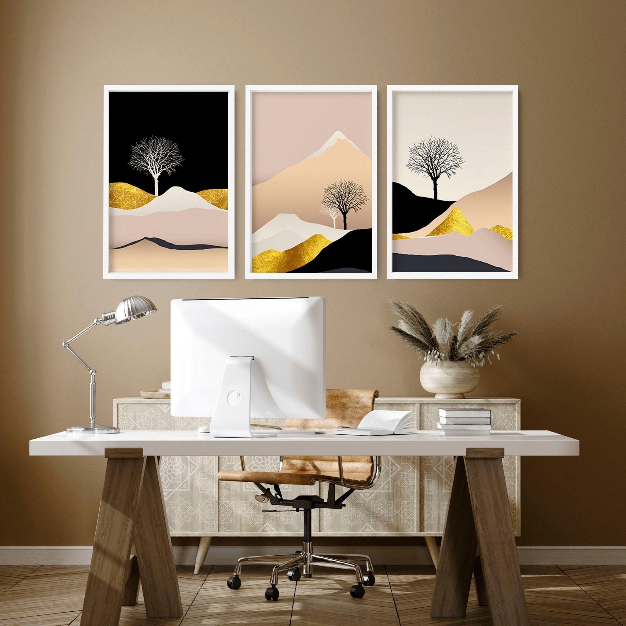 Set of 3 Scandinavian wall art prints featuring a Nordic landscape in pink, black, and gold tones, perfect for office decor.