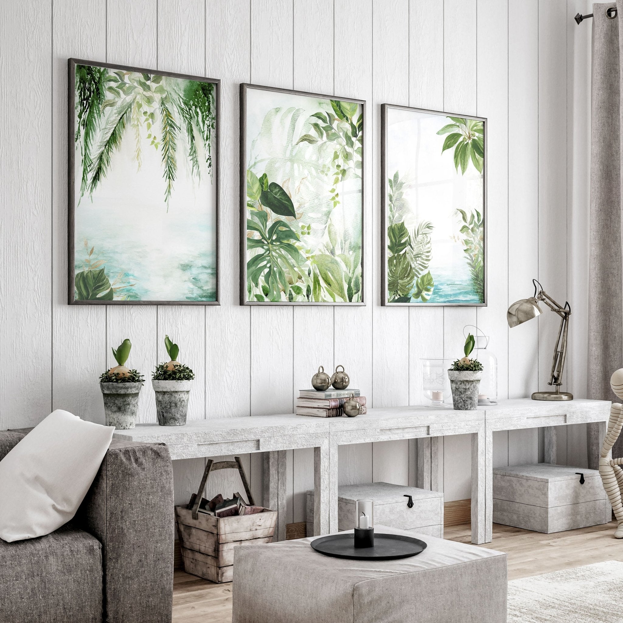 Set of 3 Tropical wall art prints featuring lush greenery and aquamarine tones, perfect for home decor.