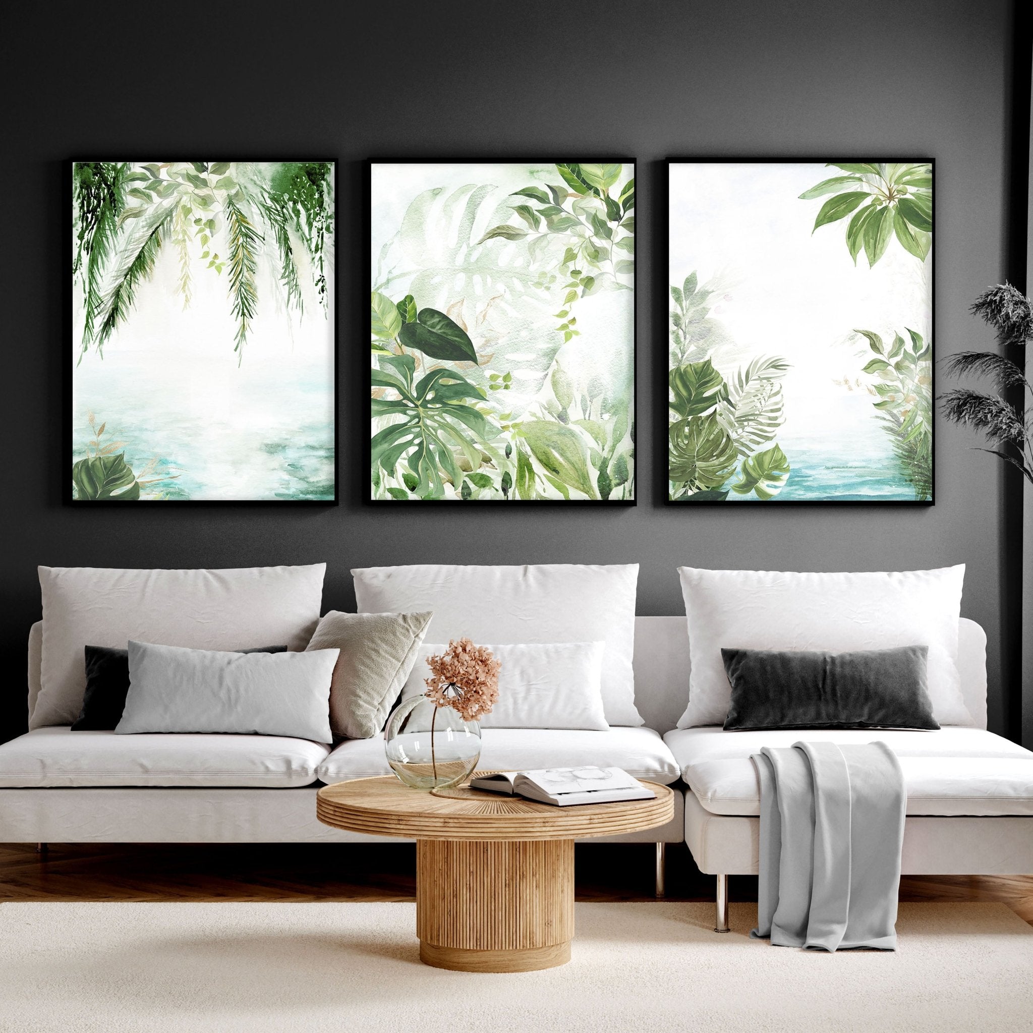 Set of 3 Tropical wall art prints featuring lush greenery and aquamarine tones, perfect for home decor.