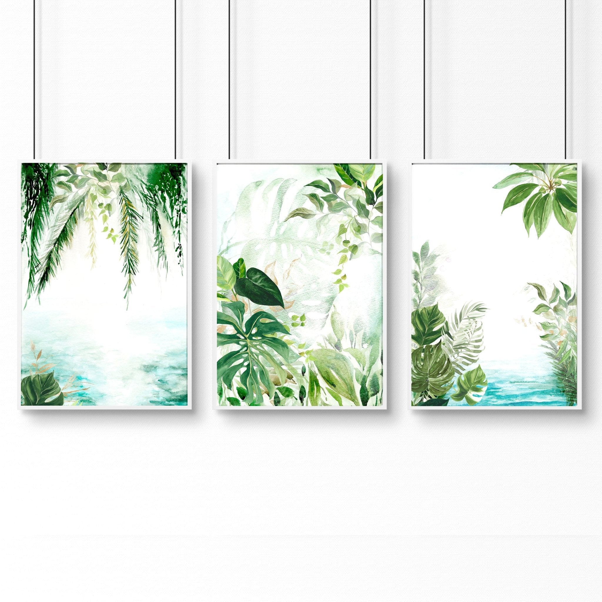 Set of 3 Tropical wall art prints featuring lush greenery and aquamarine tones, perfect for home decor.