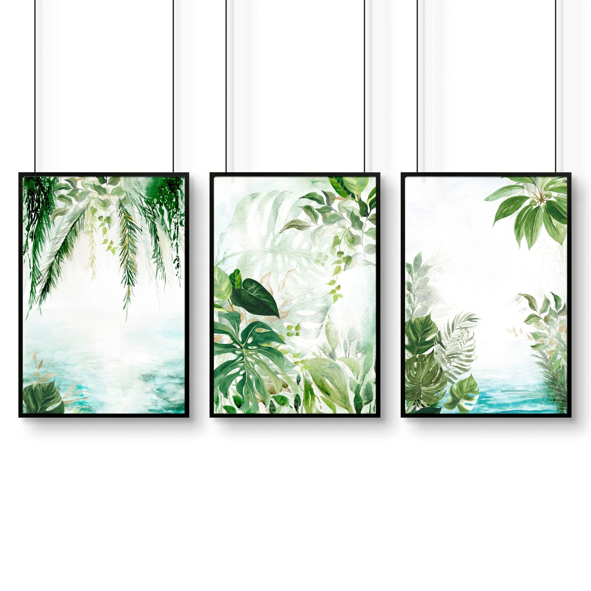 Set of 3 Tropical wall art prints featuring lush greenery and aquamarine tones, perfect for home decor.