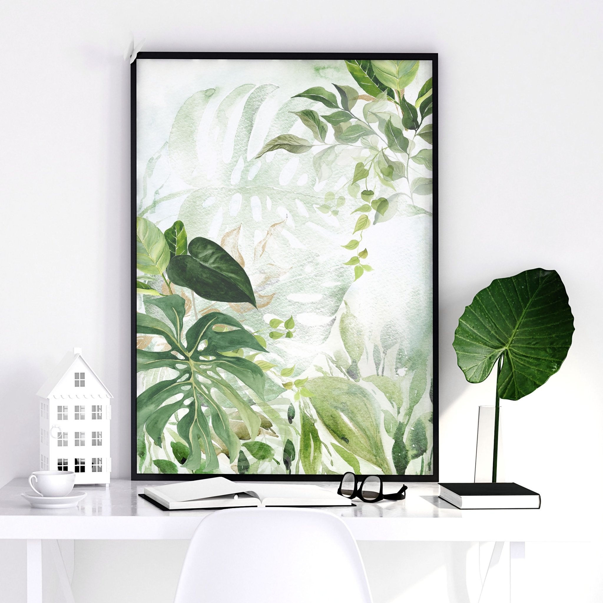 Set of 3 Tropical wall art prints featuring lush greenery and aquamarine tones, perfect for home decor.