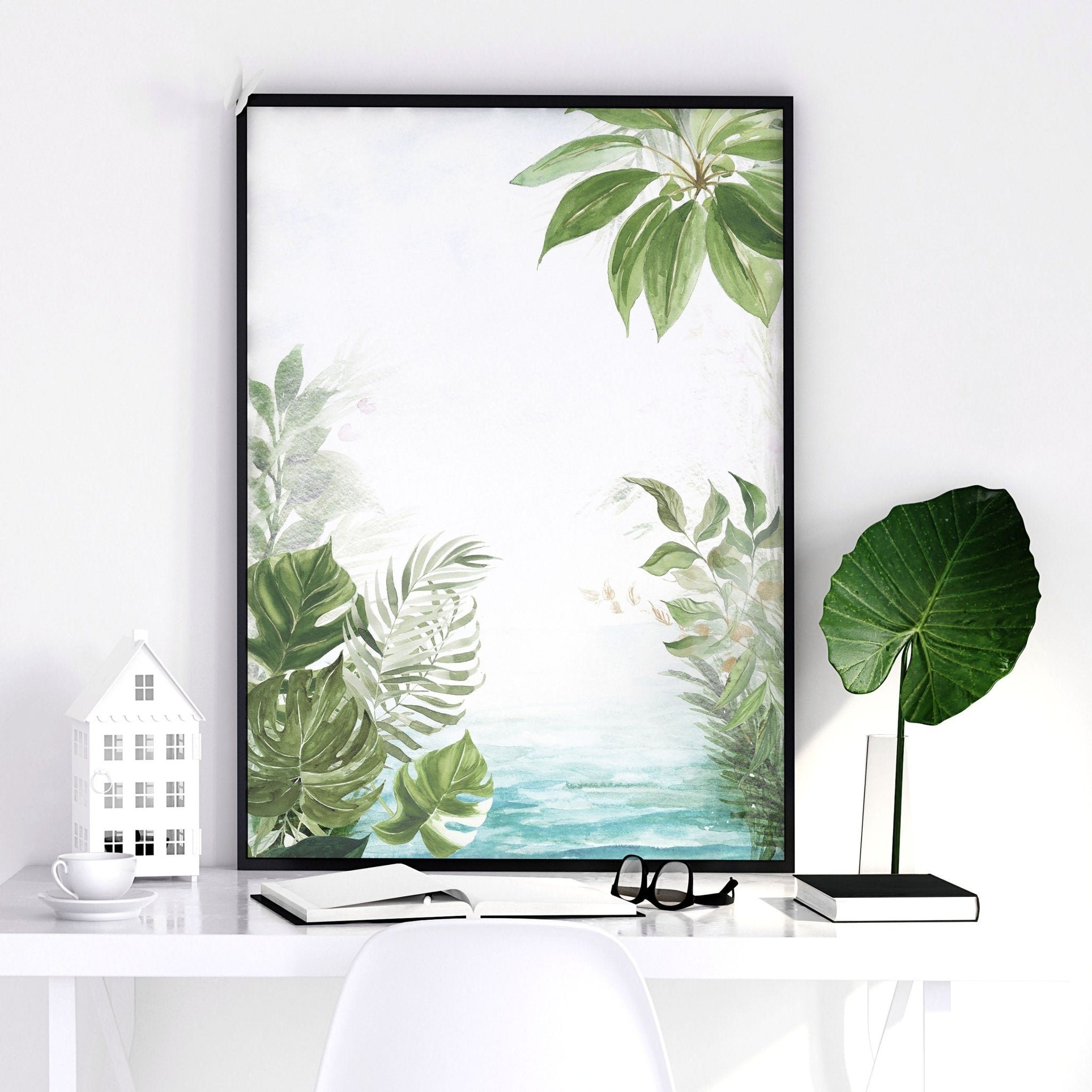 Set of 3 Tropical wall art prints featuring lush greenery and aquamarine tones, perfect for home decor.