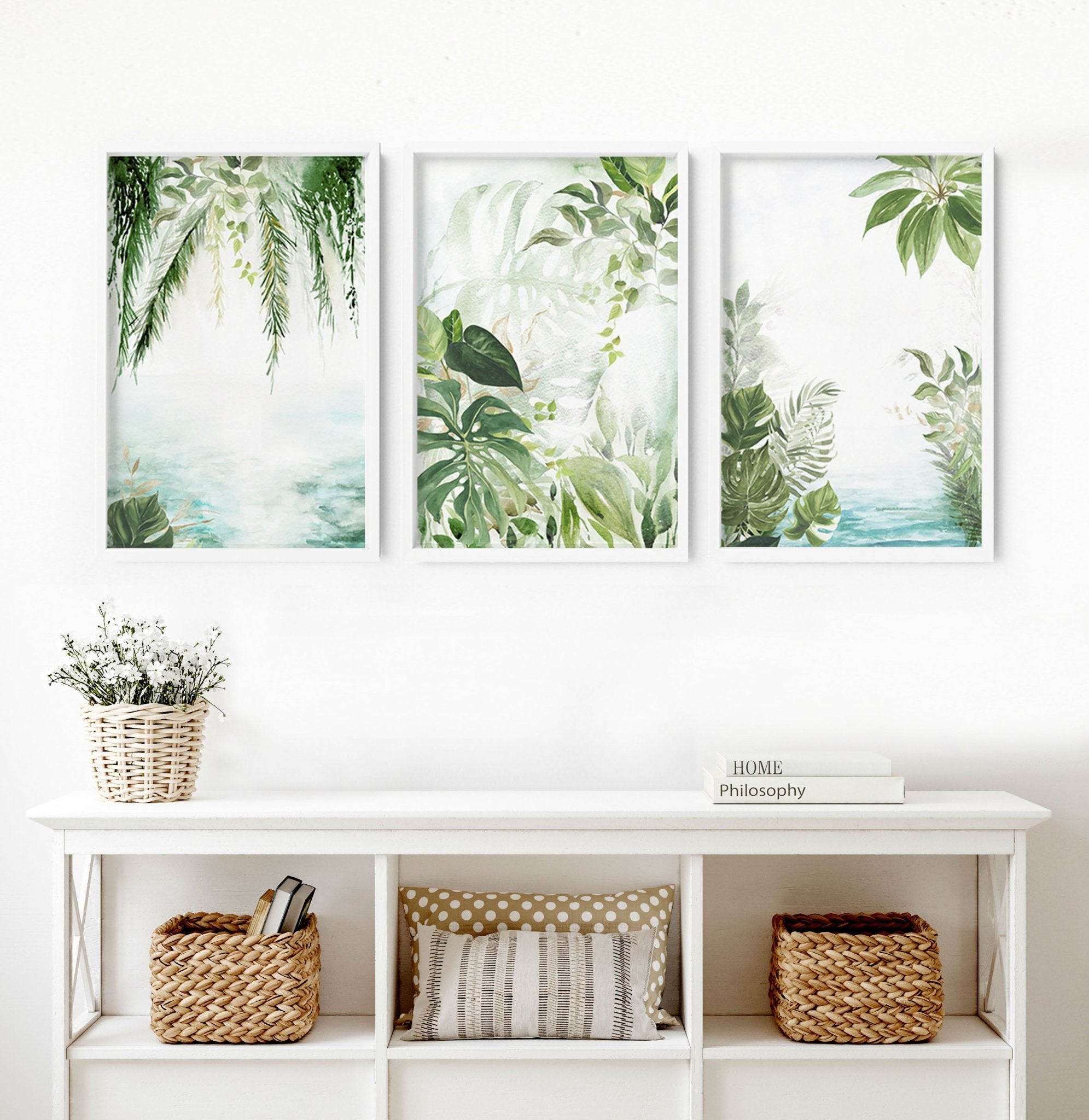 Set of 3 Tropical wall art prints featuring lush greenery and aquamarine tones, perfect for home decor.