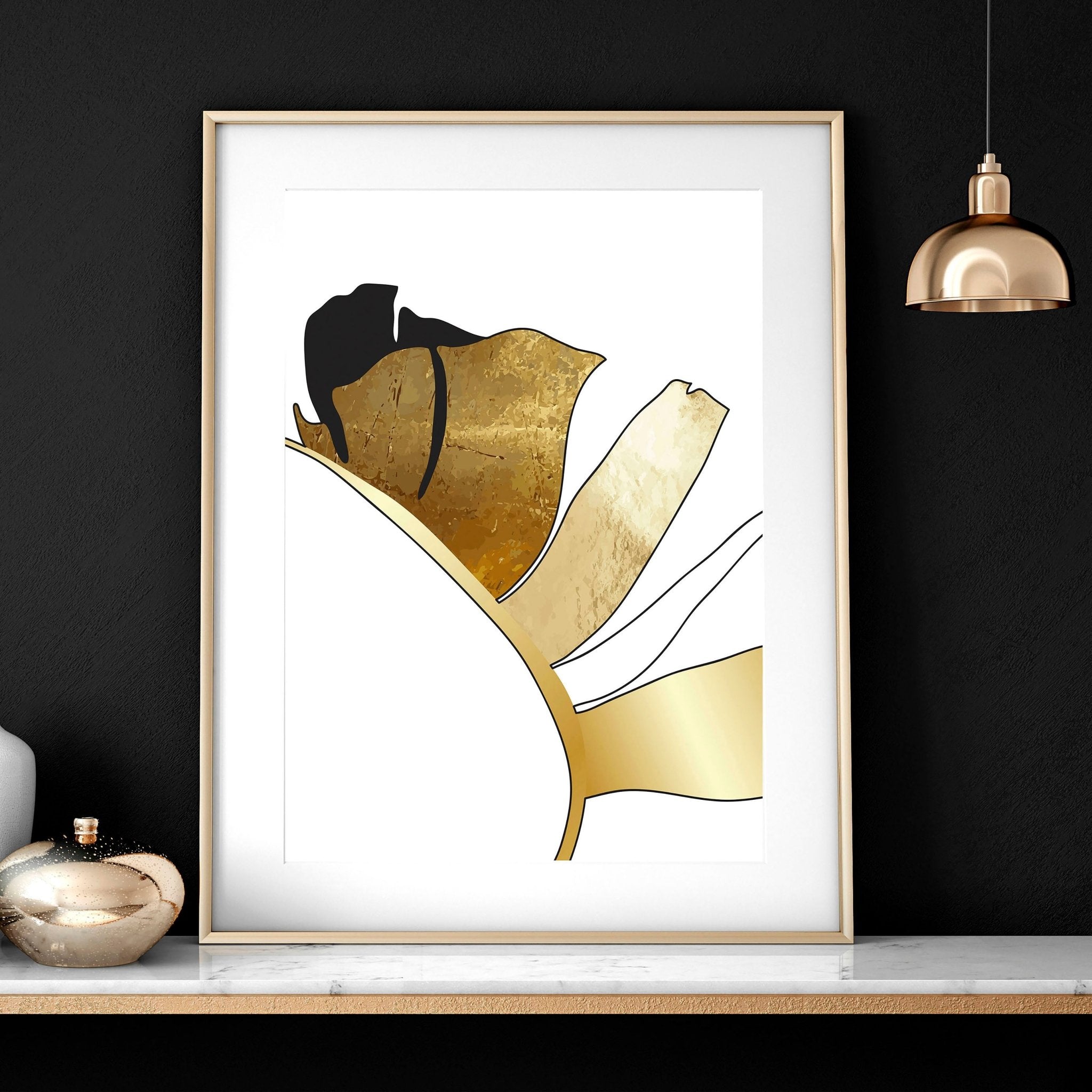 Set of 3 modern tropical wall art prints featuring elegant botanical designs in white, black, and gold, perfect for living room decor.