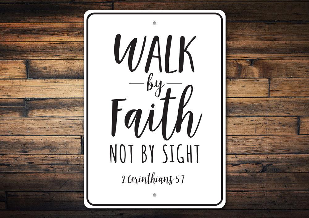 Decorative Walk by Faith Sign made of durable aluminum, featuring inspirational text and designed for easy wall mounting.