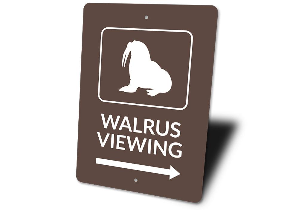 A decorative Walrus Viewing Sign made of aluminum, featuring a whimsical design perfect for beach-themed decor.