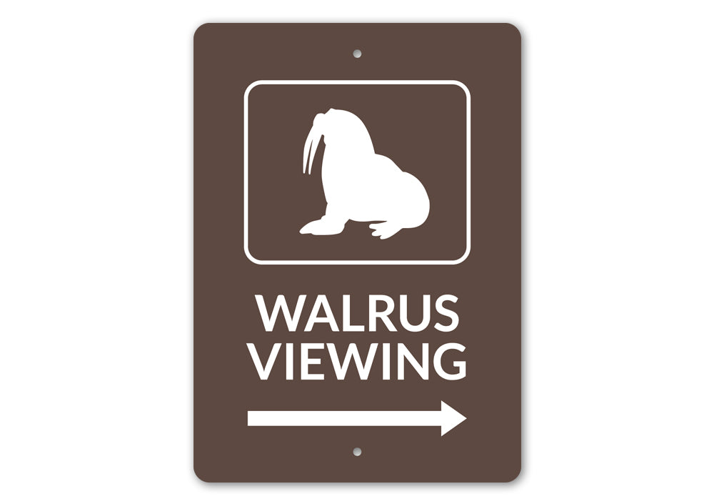 A decorative Walrus Viewing Sign made of aluminum, featuring a whimsical design perfect for beach-themed decor.