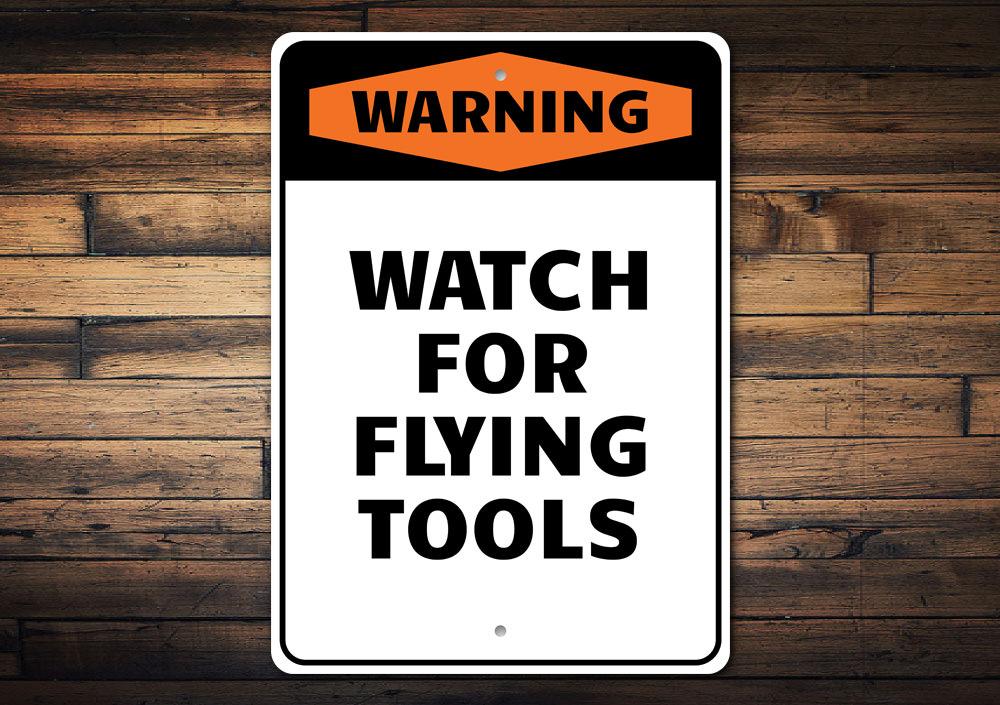 Watch for Flying Tools sign made of high-quality aluminum, featuring pre-drilled holes for easy mounting, ideal for home or garage decor.