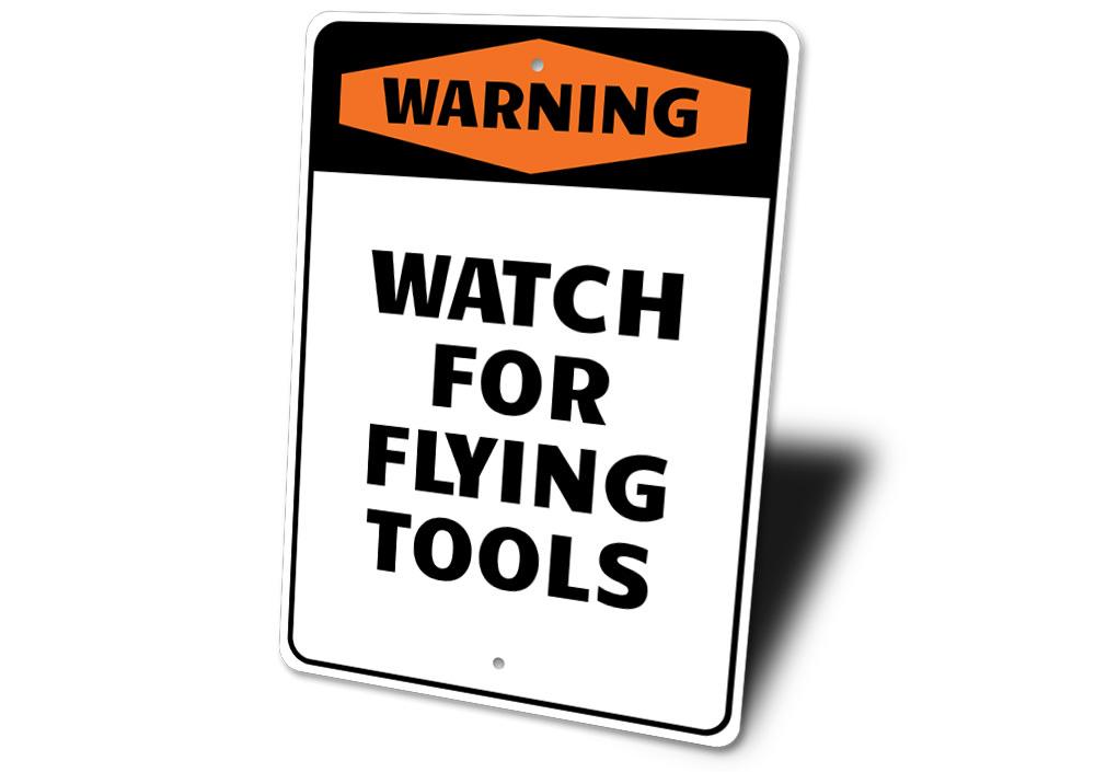 Watch for Flying Tools sign made of high-quality aluminum, featuring pre-drilled holes for easy mounting, ideal for home or garage decor.