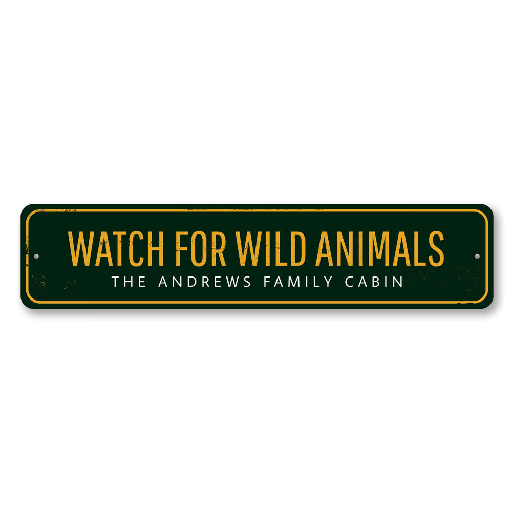 A decorative 'Watch For Wild Animals' sign made of durable aluminum, featuring customizable text, ideal for lakehouse decor.