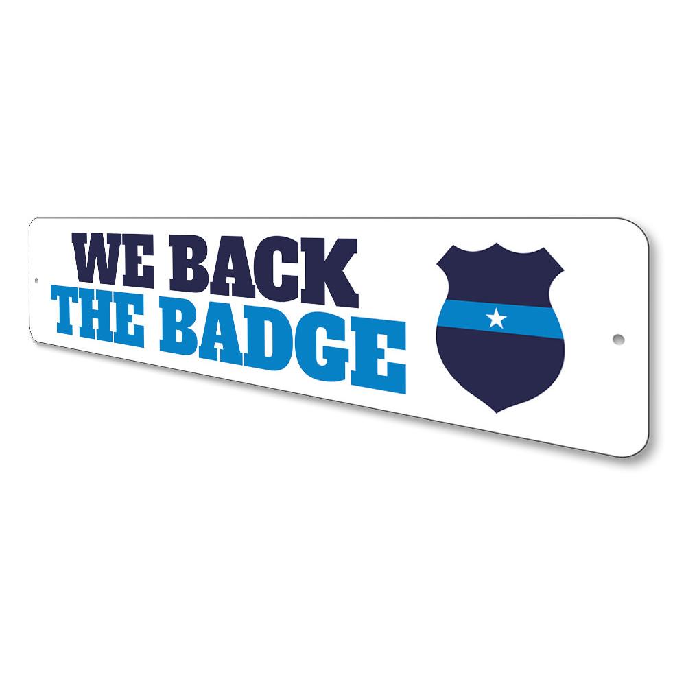 We Back the Badge Sign made of high-quality aluminum, featuring a bold design suitable for indoor and outdoor decor.