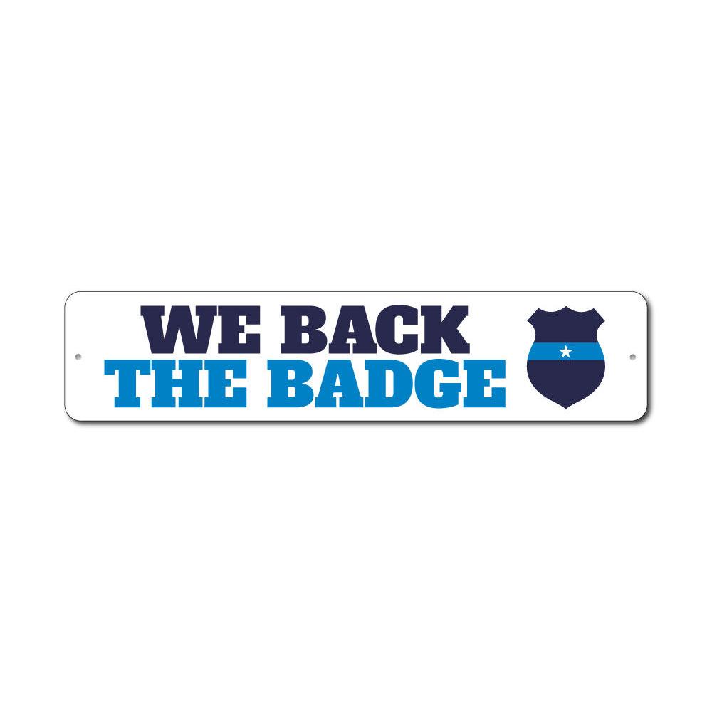 We Back the Badge Sign made of high-quality aluminum, featuring a bold design suitable for indoor and outdoor decor.