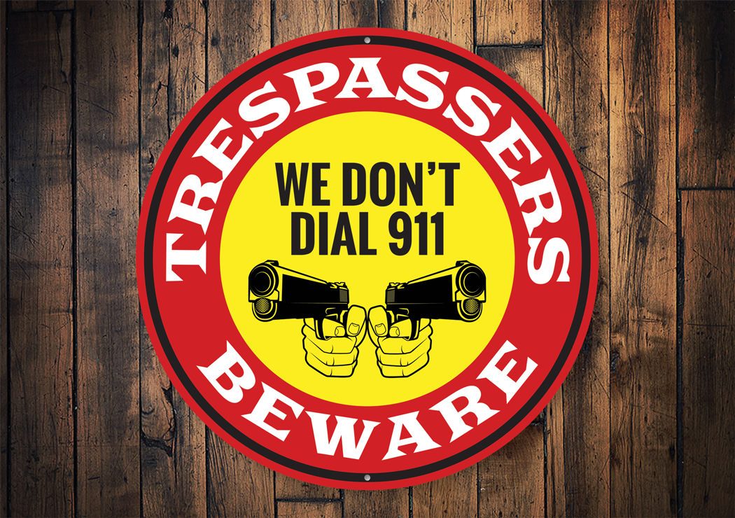 We Don't Dial 911 No Trespassing Caution Sign made of durable aluminum, featuring a bold design suitable for indoor and outdoor use.