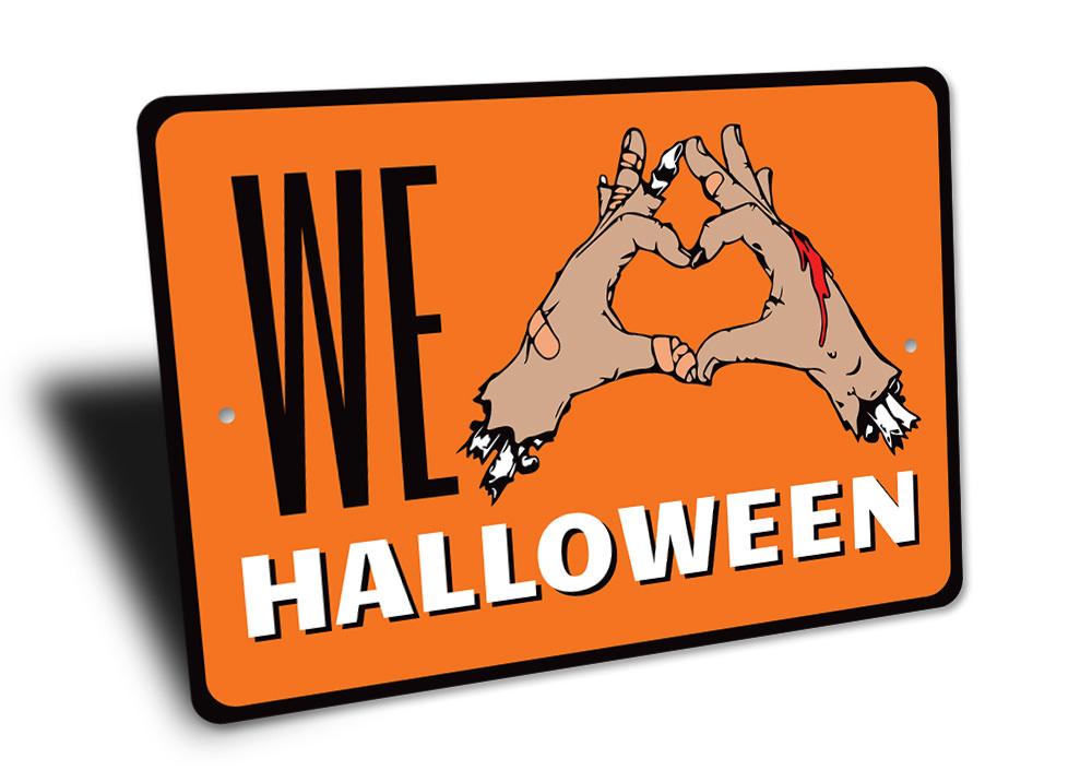 We Love Halloween Sign made of durable aluminum, featuring spooky design elements perfect for Halloween decor.