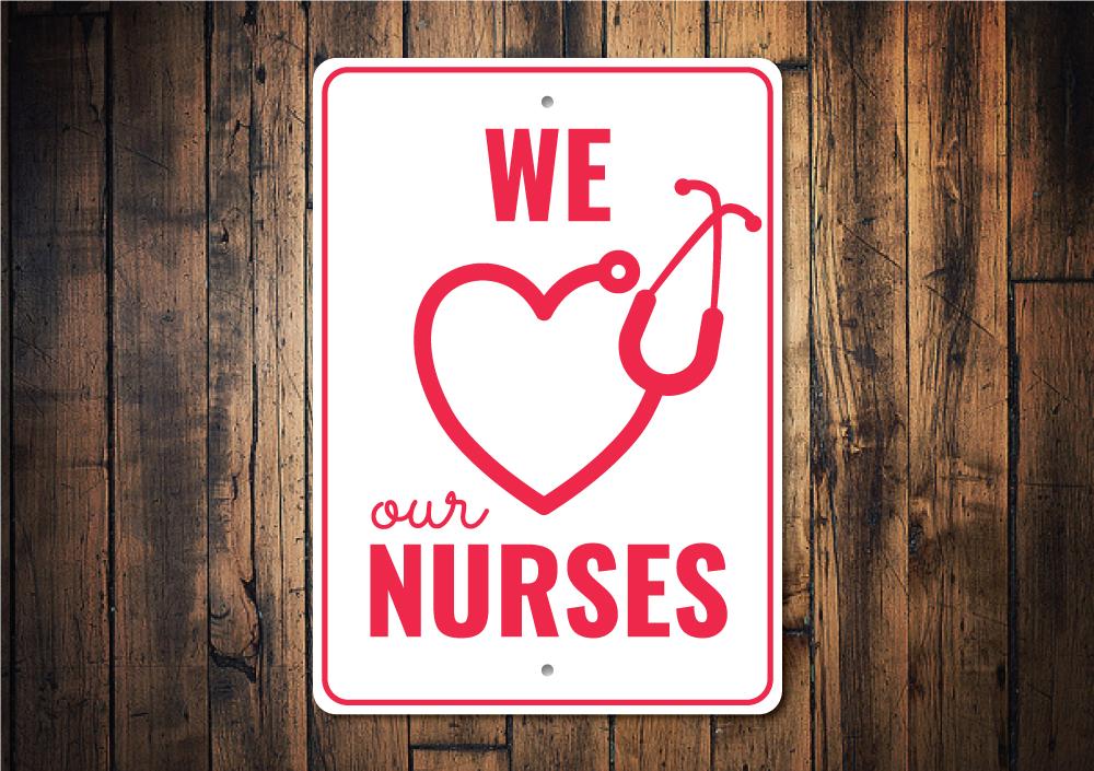 We Love our Nurses Sign made of durable aluminum, featuring vibrant colors and a heartfelt design, perfect for home or office decor.