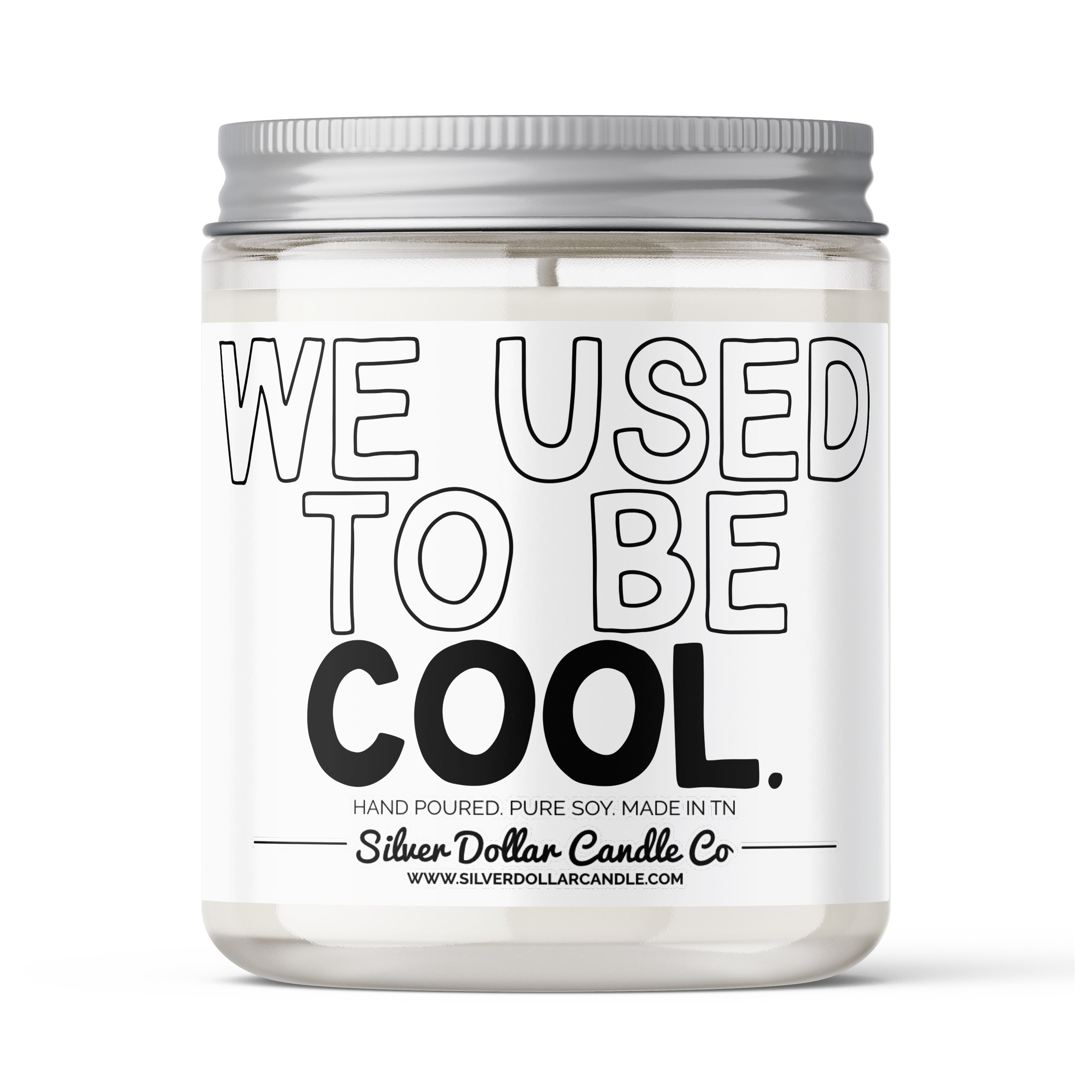 We Used To Be Cool Candle in a stylish jar with a humorous label, showcasing its unique scent options.