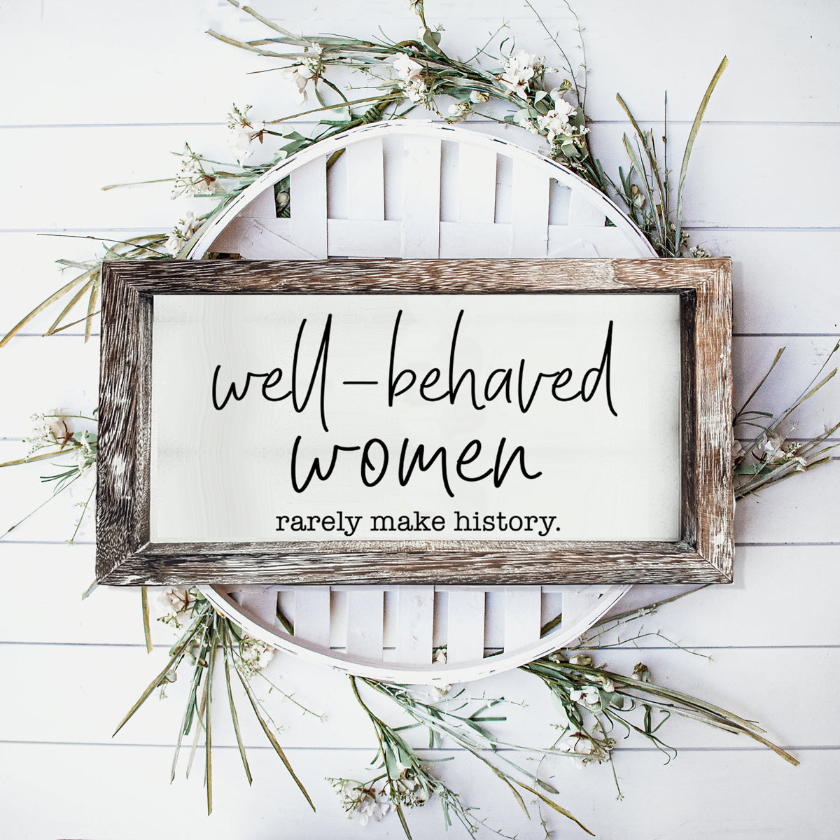 Well Behaved Women Sign made of durable Paulownia wood, featuring a stylish wooden frame with an empowering message.