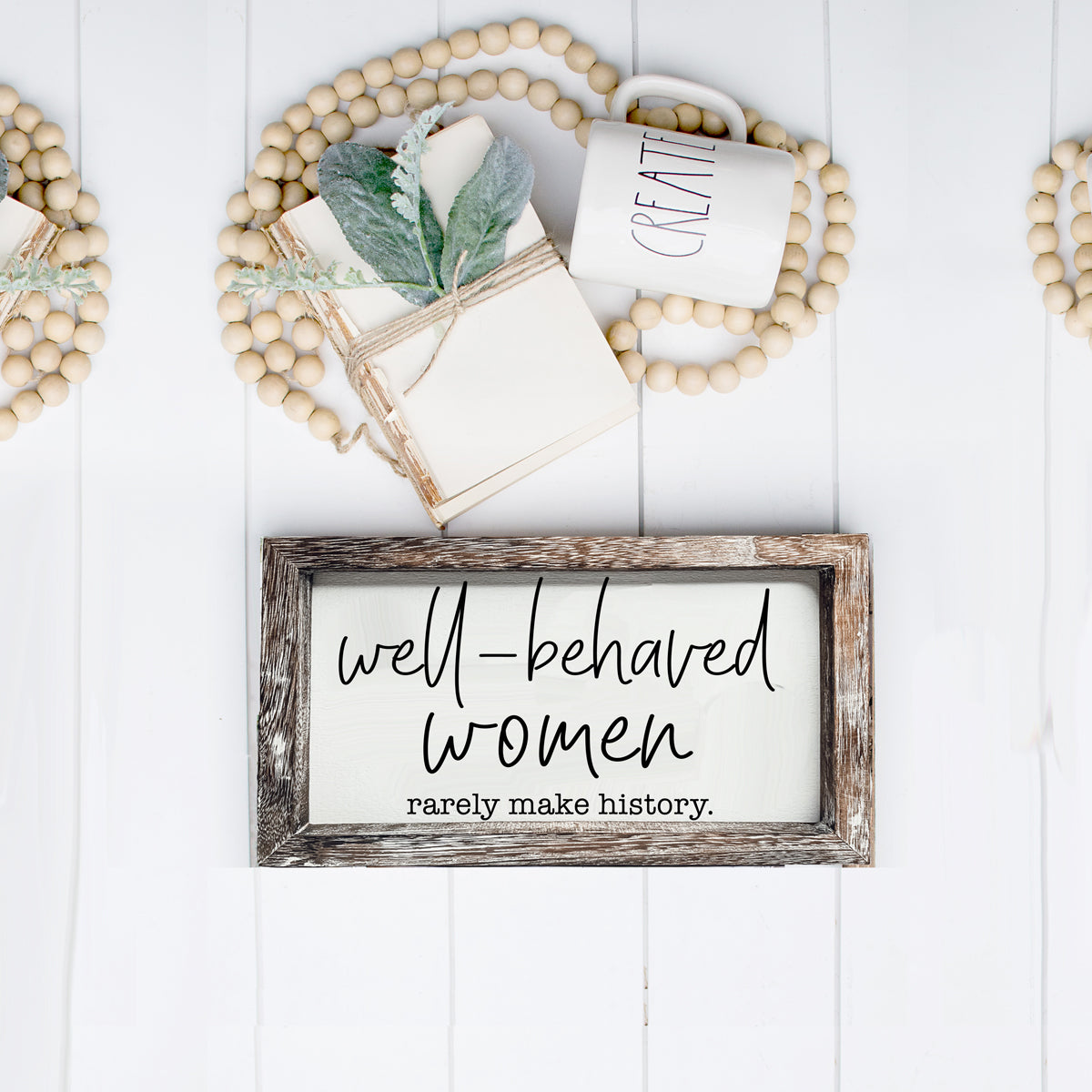 Well Behaved Women Sign made of durable Paulownia wood, featuring a stylish wooden frame with an empowering message.