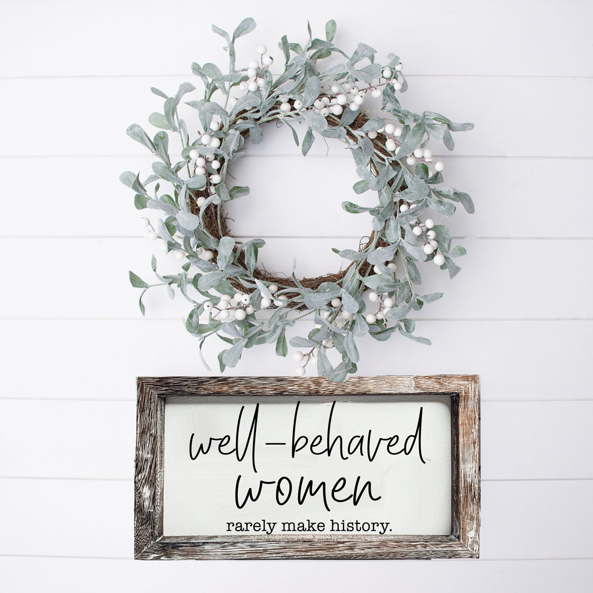 Well Behaved Women Sign made of durable Paulownia wood, featuring a stylish wooden frame with an empowering message.