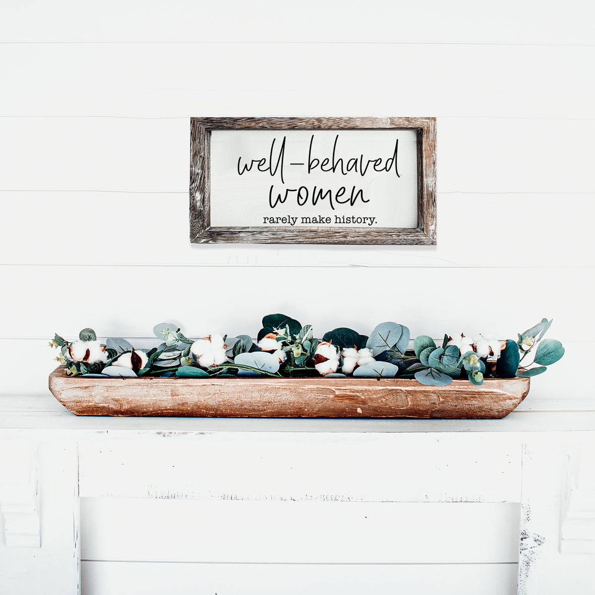 Well Behaved Women Sign made of durable Paulownia wood, featuring a stylish wooden frame with an empowering message.