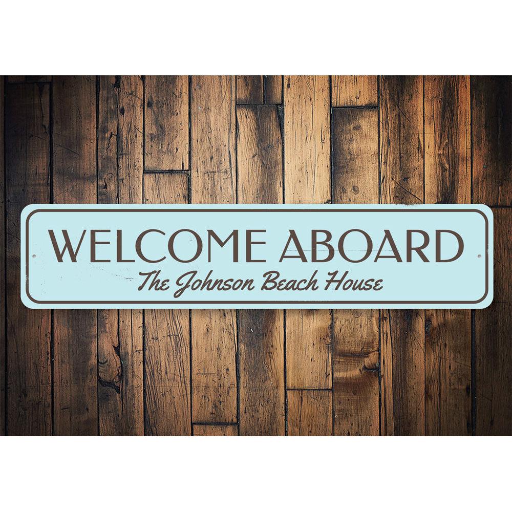 Welcome Aboard Beach House Sign made of durable aluminum, featuring customizable text and pre-drilled holes for easy mounting.