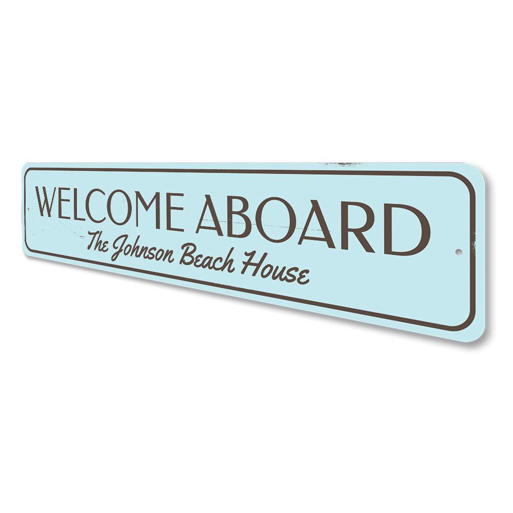 Welcome Aboard Beach House Sign made of durable aluminum, featuring customizable text and pre-drilled holes for easy mounting.