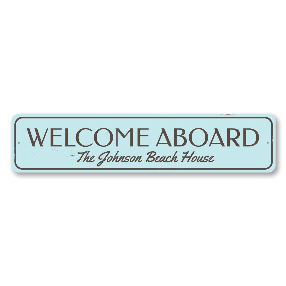 Welcome Aboard Beach House Sign made of durable aluminum, featuring customizable text and pre-drilled holes for easy mounting.