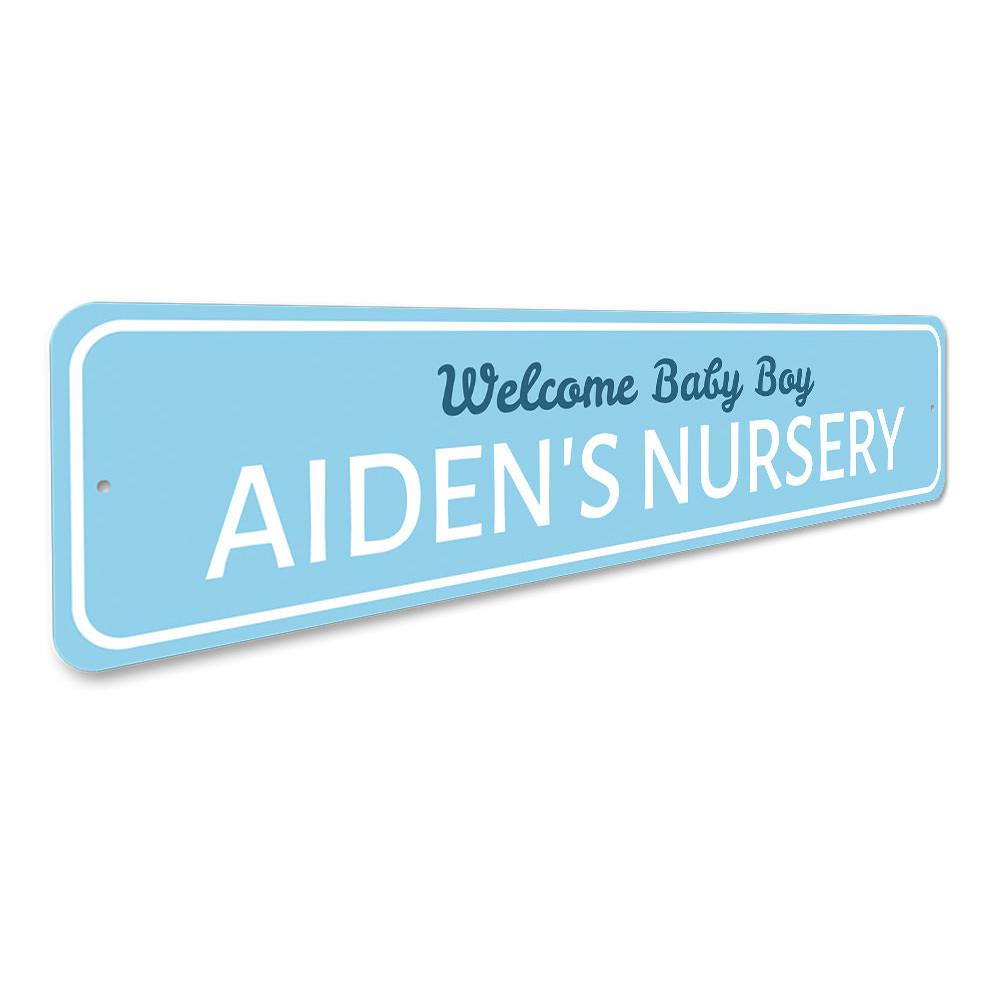 Welcome Baby Boy Sign made of high-quality aluminum, featuring a charming design suitable for a nursery.