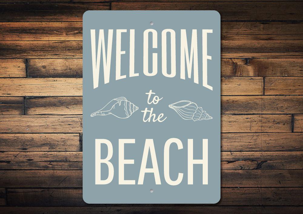 A beautifully crafted Welcome Beach Sign made of aluminum, featuring coastal-themed design elements, perfect for beach houses and decor.