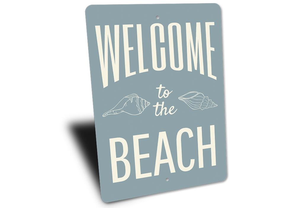 A beautifully crafted Welcome Beach Sign made of aluminum, featuring coastal-themed design elements, perfect for beach houses and decor.