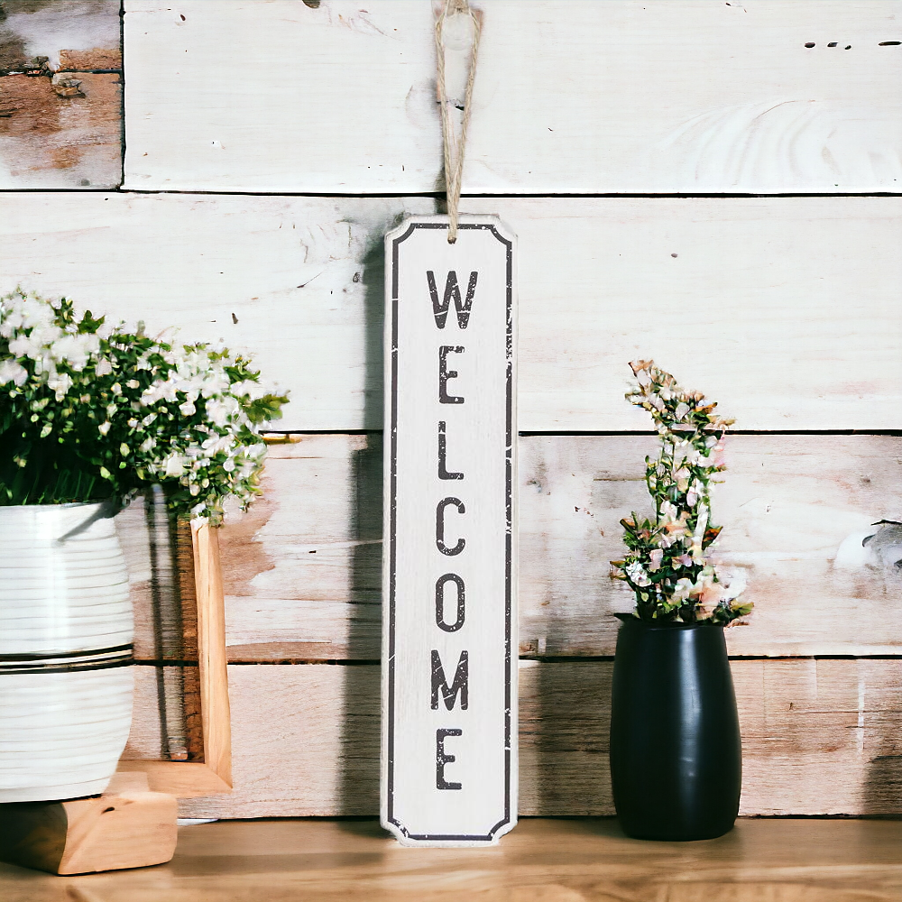 A stylish hanging wood sign displaying the word 'Welcome' in black letters on a white background, perfect for door decoration.