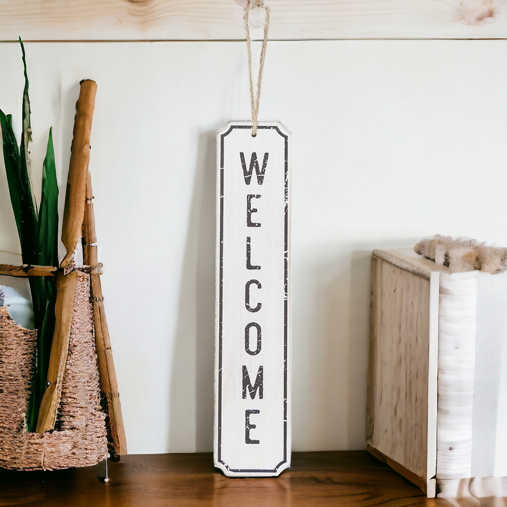 A stylish hanging wood sign displaying the word 'Welcome' in black letters on a white background, perfect for door decoration.