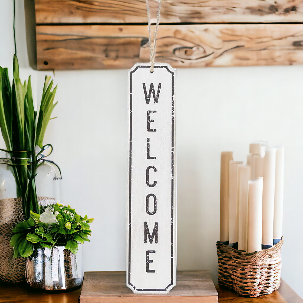 A stylish hanging wood sign displaying the word 'Welcome' in black letters on a white background, perfect for door decoration.