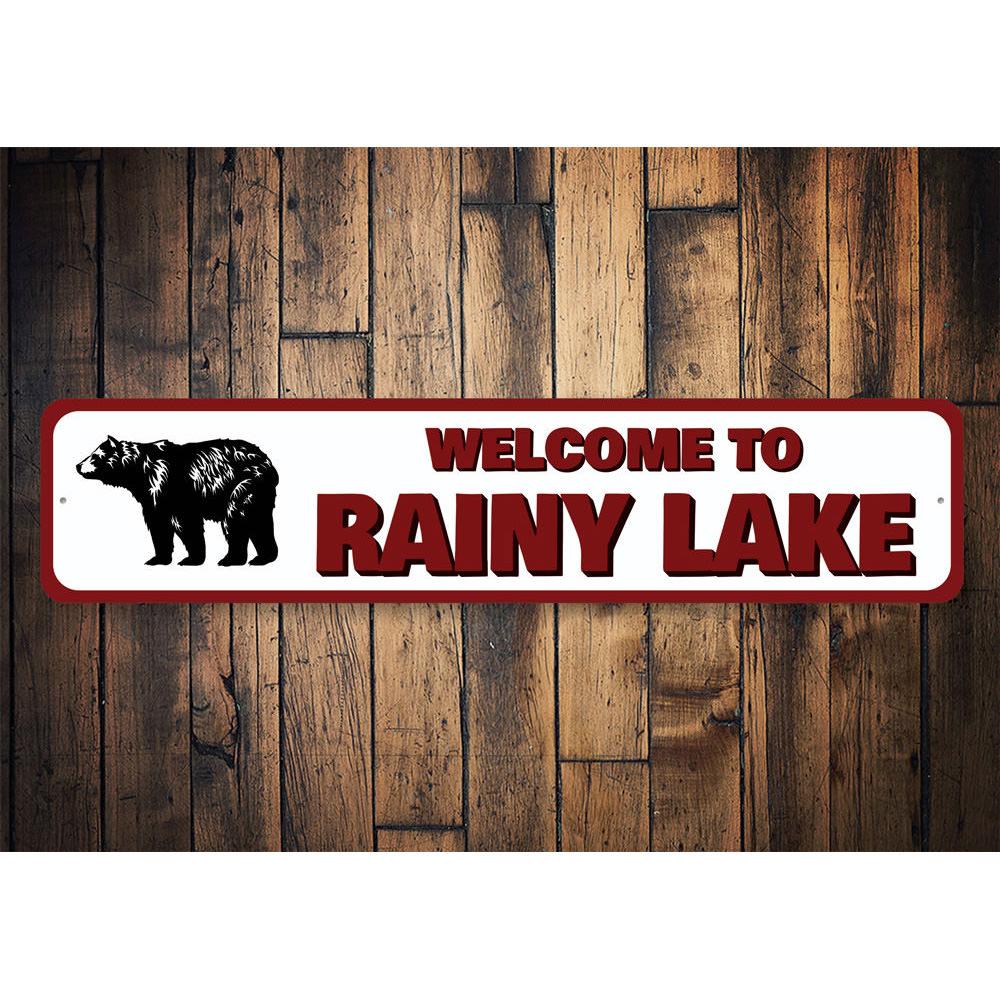 A personalized Welcome to Lake Name Sign made of high-quality aluminum, featuring customizable text and a rustic design, perfect for lakehouses.