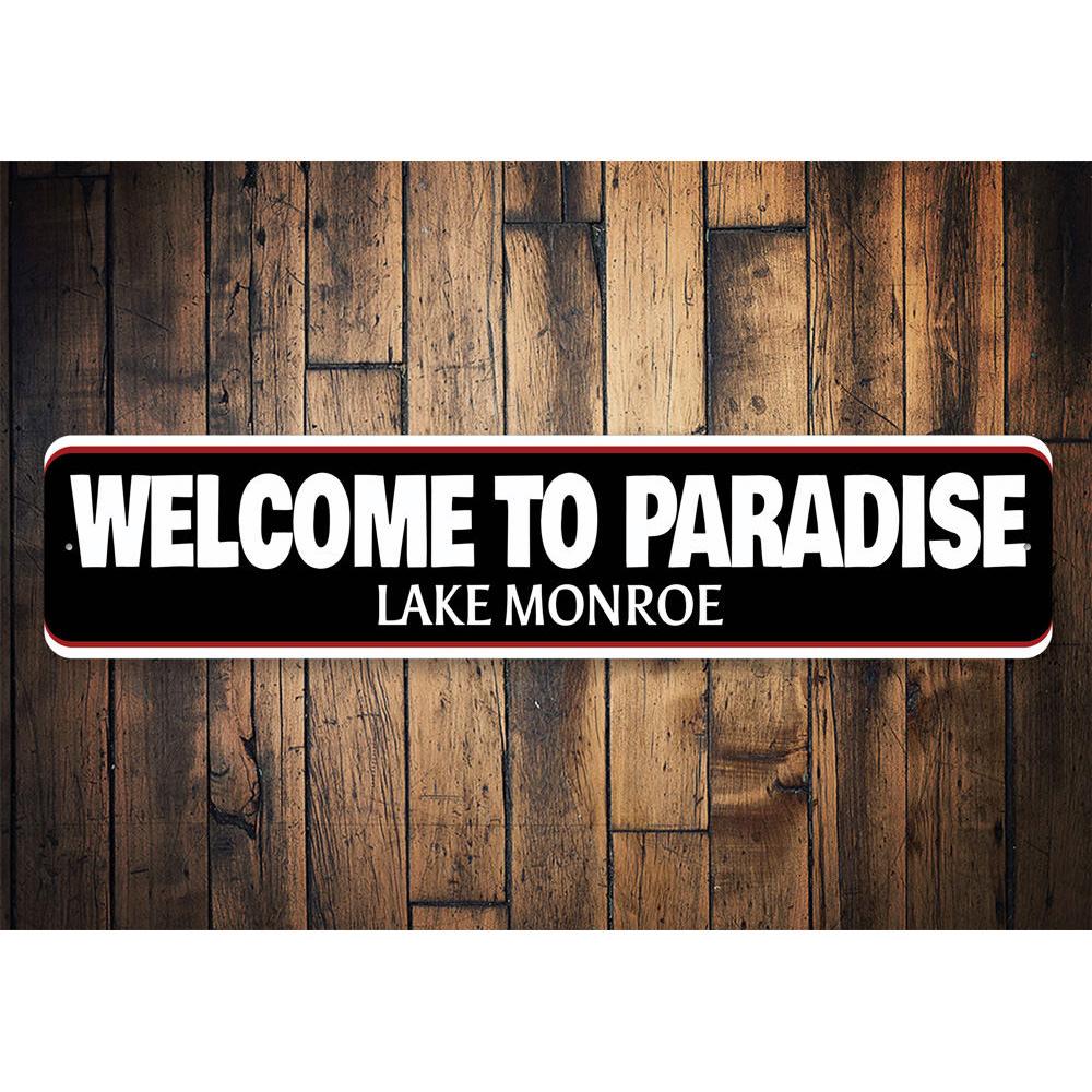 A beautifully crafted Welcome to Paradise Lake Sign made from high-quality aluminum, featuring customizable text and a vibrant design, perfect for lakehouses.