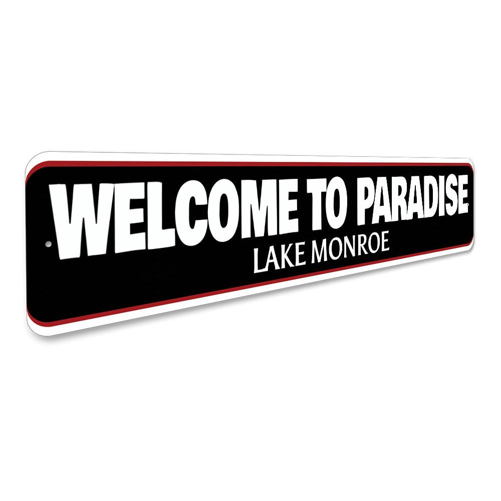 A beautifully crafted Welcome to Paradise Lake Sign made from high-quality aluminum, featuring customizable text and a vibrant design, perfect for lakehouses.