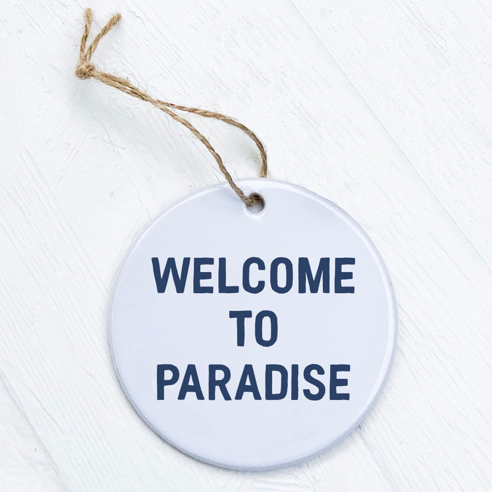 Welcome to Paradise ornament made of high-quality porcelain, featuring vibrant original designs, perfect for gifting or home decor.