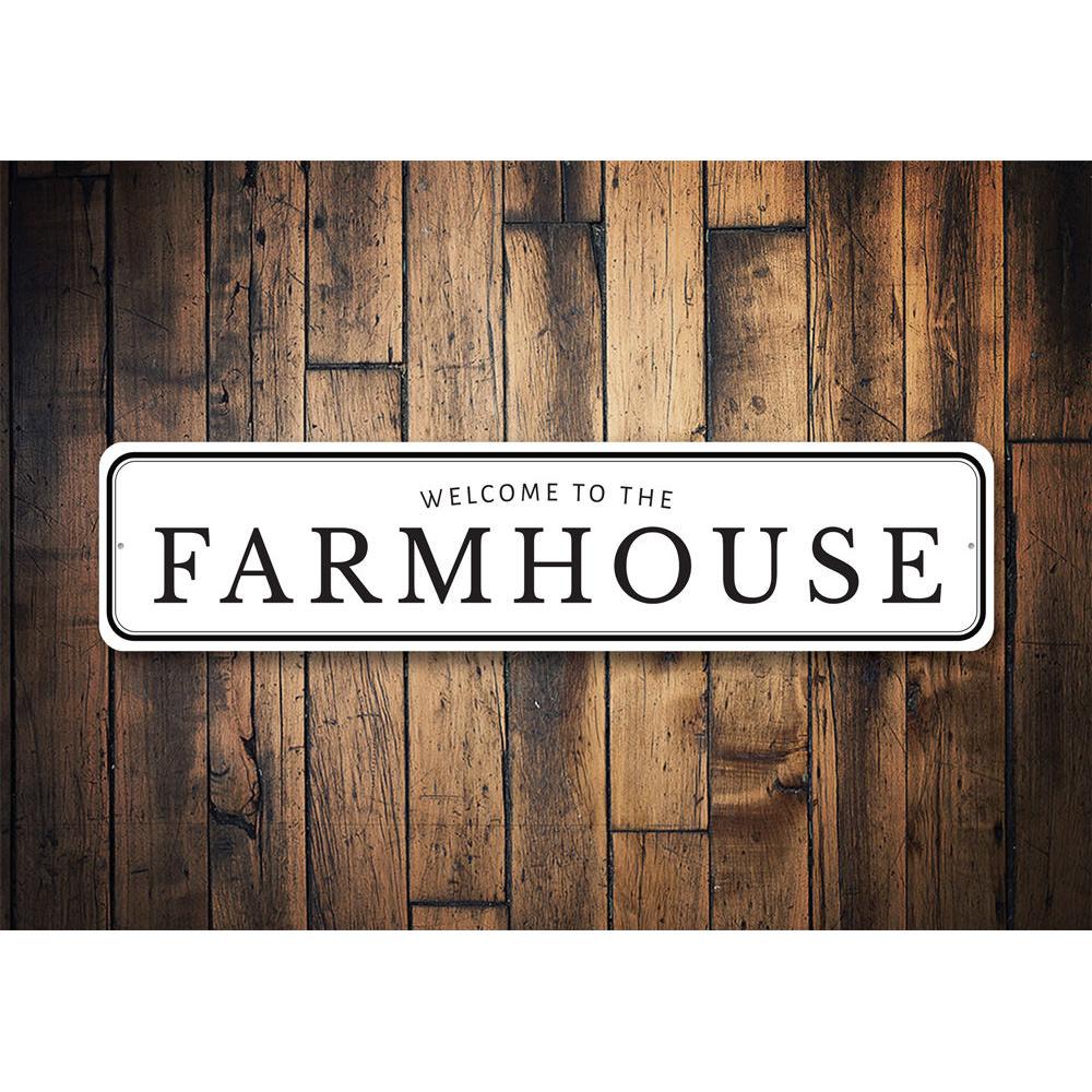 Welcome To The Farmhouse Sign made of quality aluminum, featuring rustic design elements suitable for home decor.