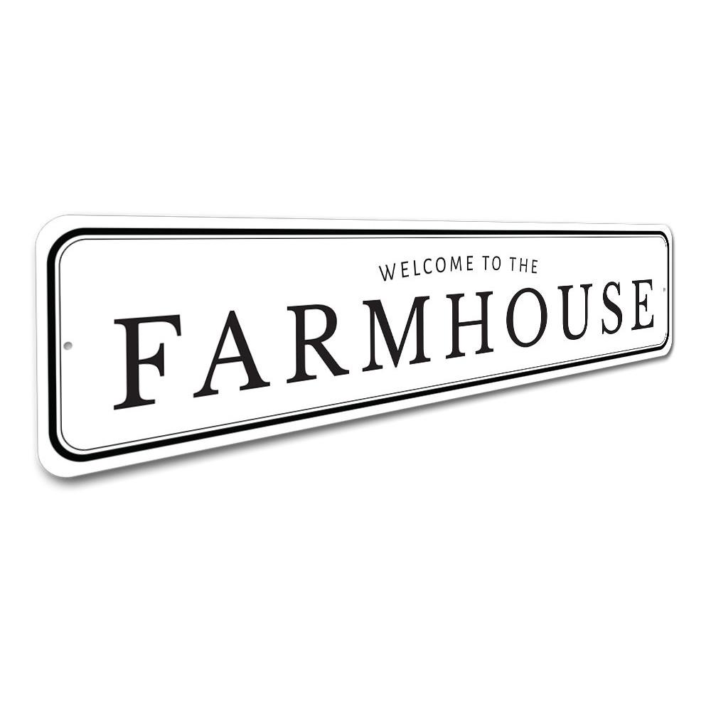 Welcome To The Farmhouse Sign made of quality aluminum, featuring rustic design elements suitable for home decor.