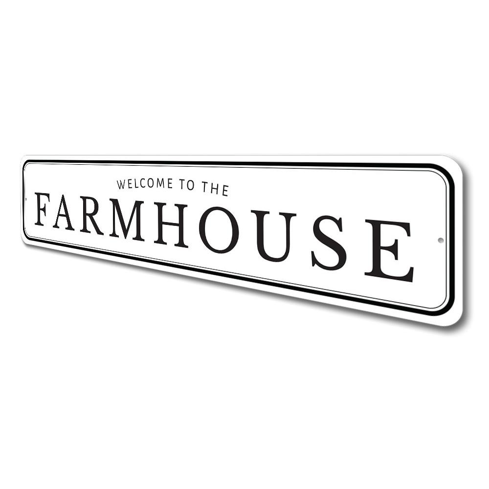 Welcome To The Farmhouse Sign made of quality aluminum, featuring rustic design elements suitable for home decor.