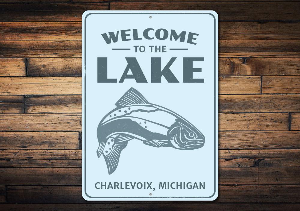 Welcome To The Lake Fish Sign made of durable aluminum, featuring a charming fish design, perfect for lakehouse decor.