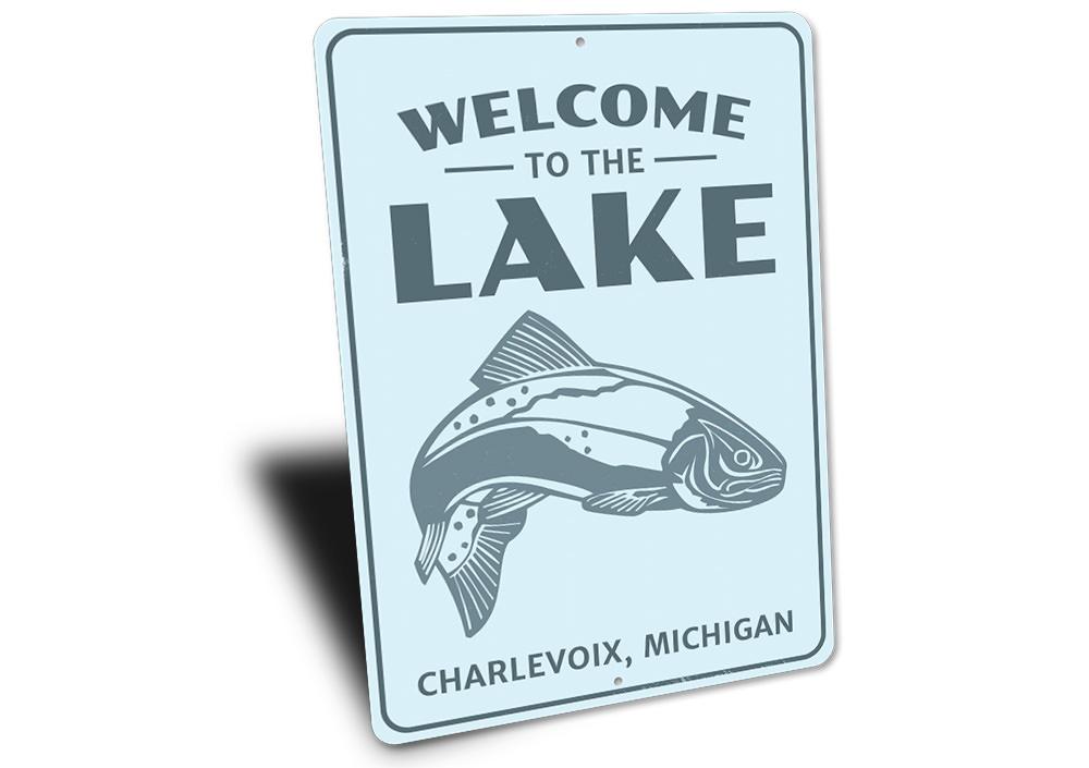 Welcome To The Lake Fish Sign made of durable aluminum, featuring a charming fish design, perfect for lakehouse decor.