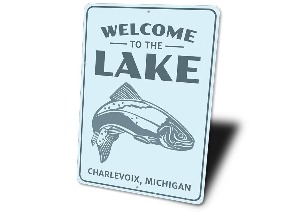 Welcome To The Lake Fish Sign made of durable aluminum, featuring a charming fish design, perfect for lakehouse decor.