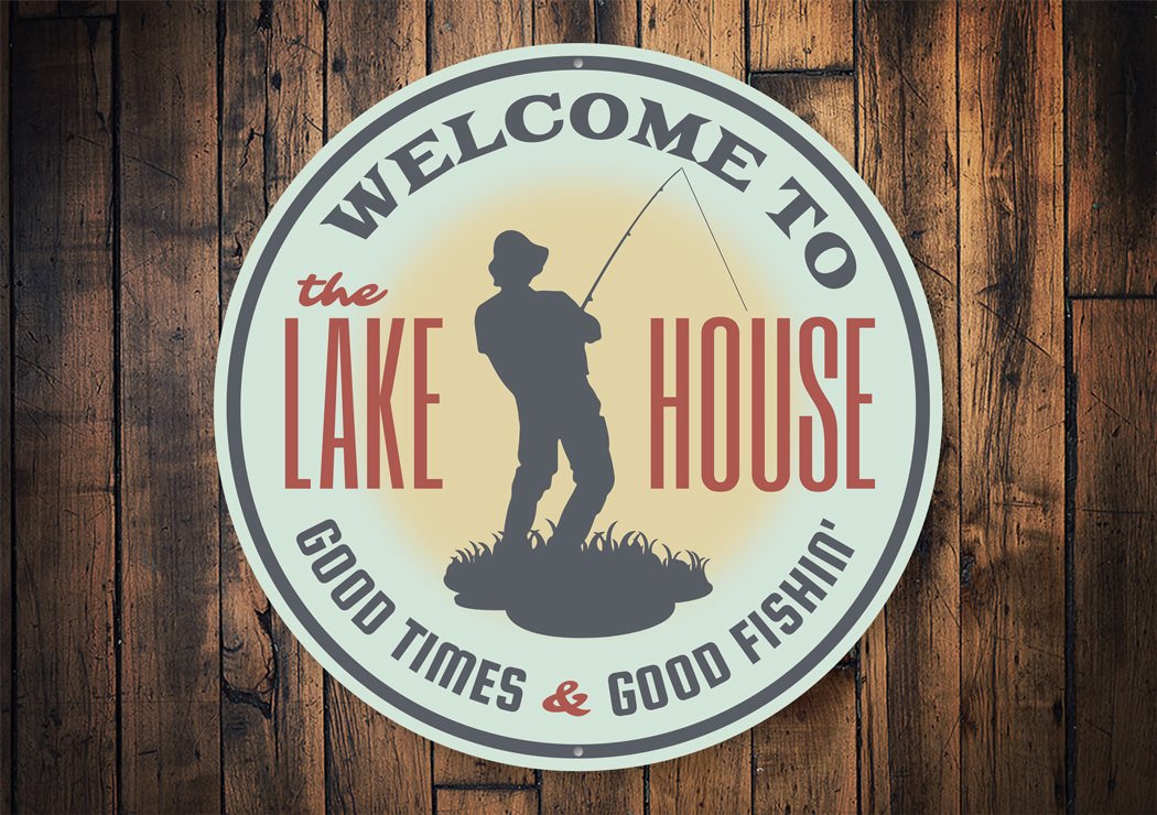 A decorative Welcome to the Lake House Sign made of high-quality aluminum, featuring customizable text and pre-drilled holes for easy mounting.