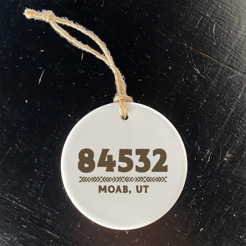 A beautifully crafted porcelain ornament featuring a customizable Western zip code design, perfect for gifting.