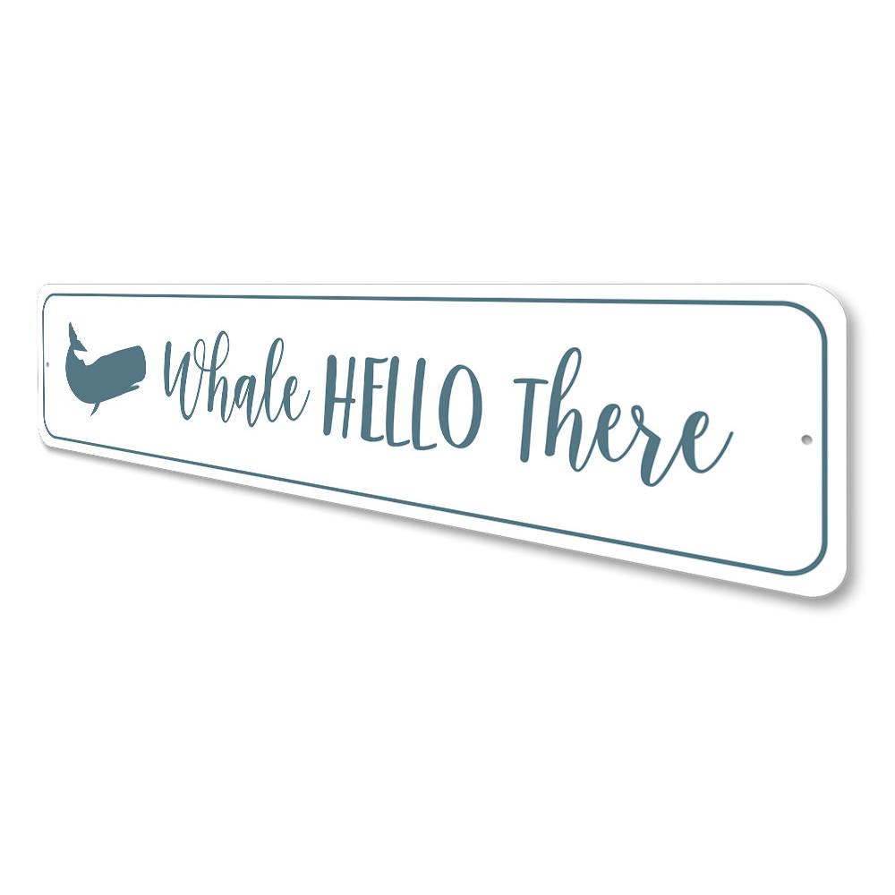 Whale Hello There Sign made of aluminum, featuring a whimsical whale design, perfect for home decor.