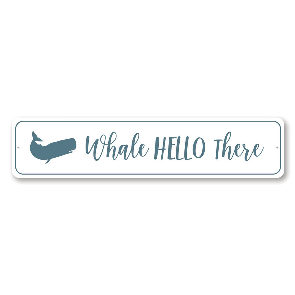 Whale Hello There Sign made of aluminum, featuring a whimsical whale design, perfect for home decor.