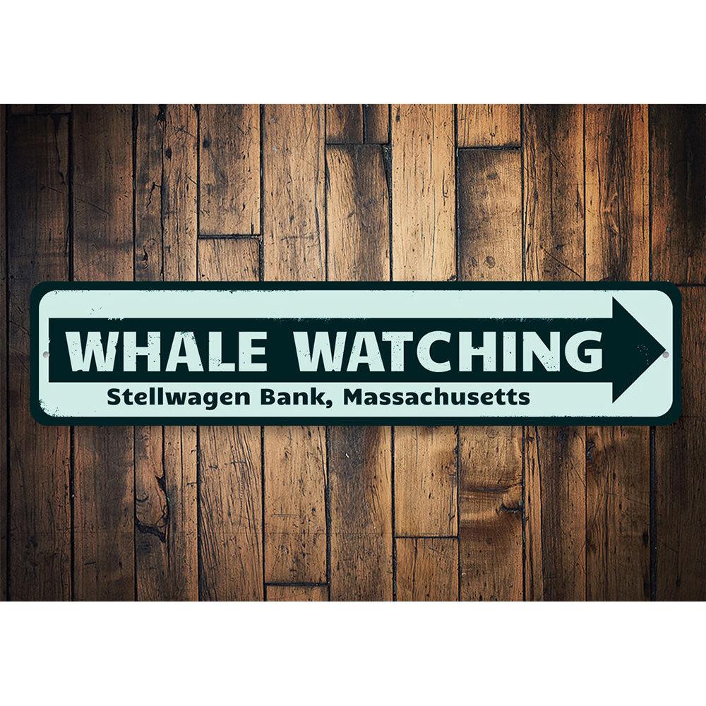 A decorative Whale Watching Location Sign made of high-quality aluminum, featuring customizable text and pre-drilled holes for easy mounting.